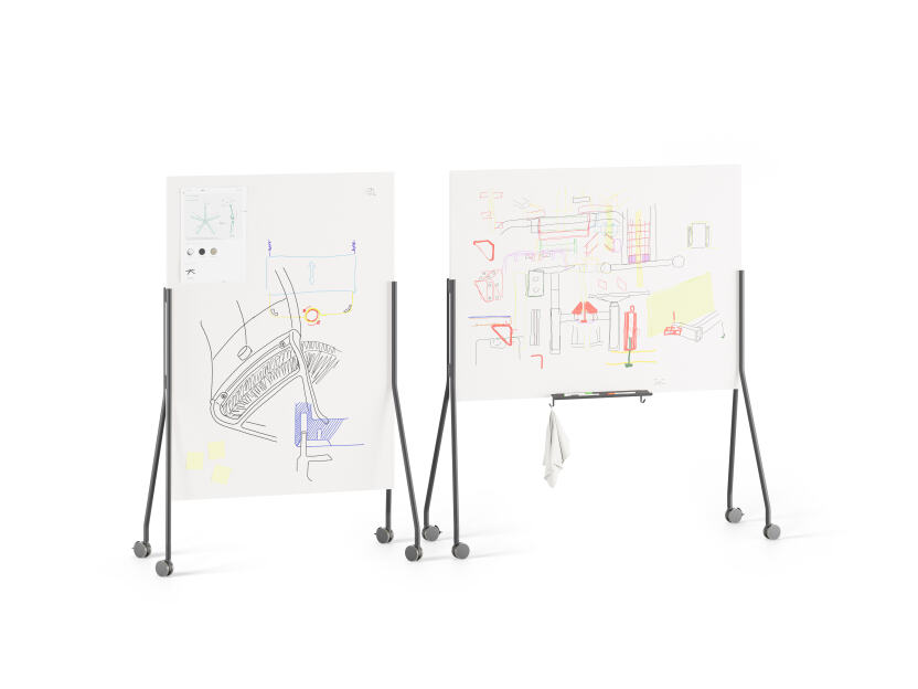 Mobile double sided whiteboards with black aluminum stands and locking wheels designed by Michel Charlot for FAUST Linoleum