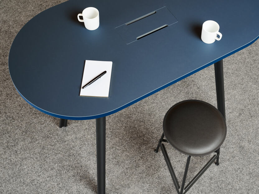 Rounded rectangle tabletop lined in blue linoleum with coloured edge mounted on Beam aluminium table legs by Daniel Lorch for FAUST Linoleum