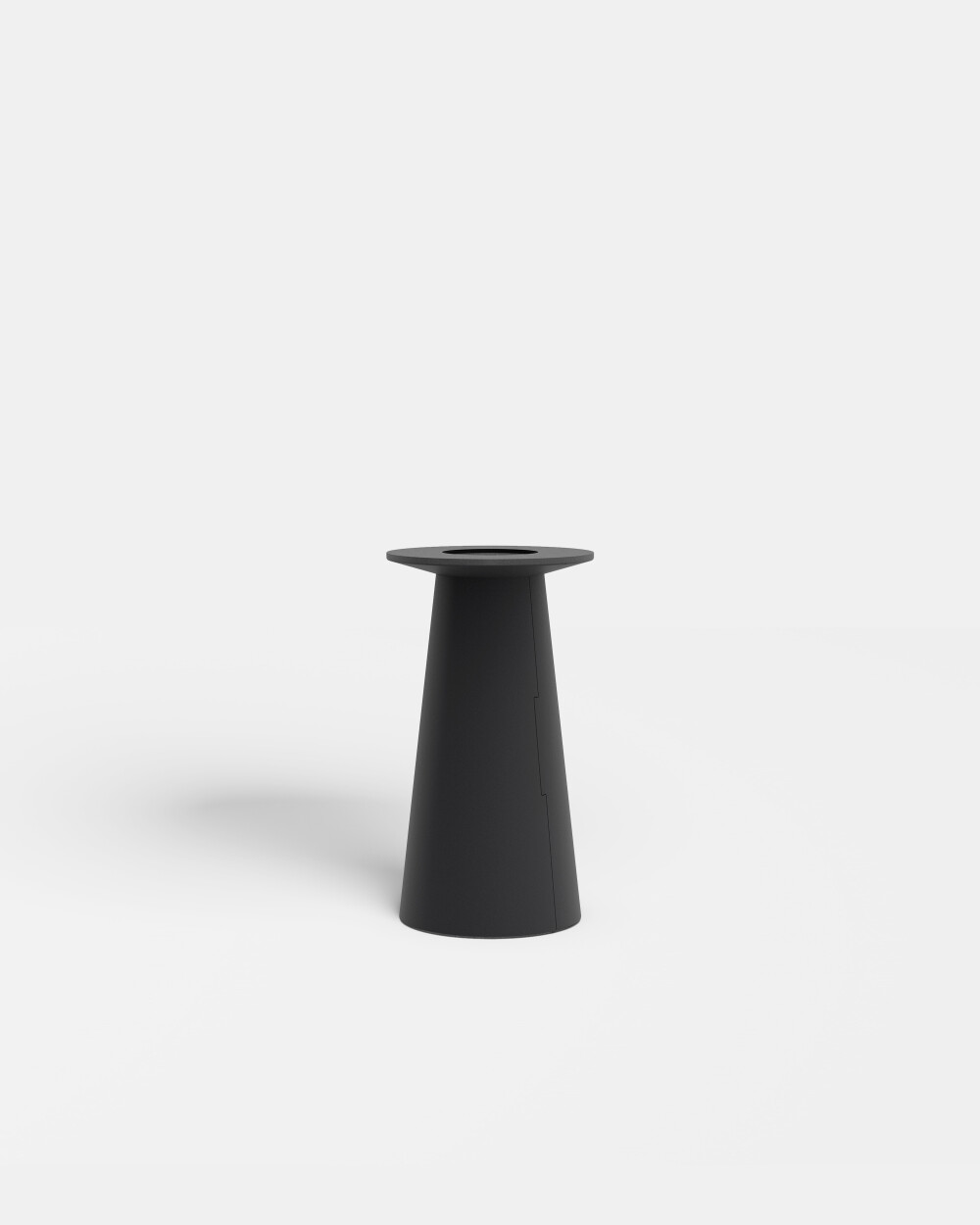 Single black linoleum cone base of the ALT table in a freestanding view.